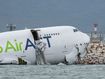 A view of the cargo aircraft that skidded off a Hong Kong runway on Monday, October 20, 2025.